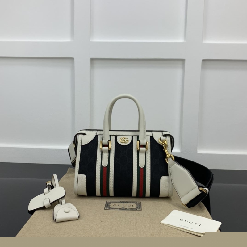 G*u*i top handle bags
